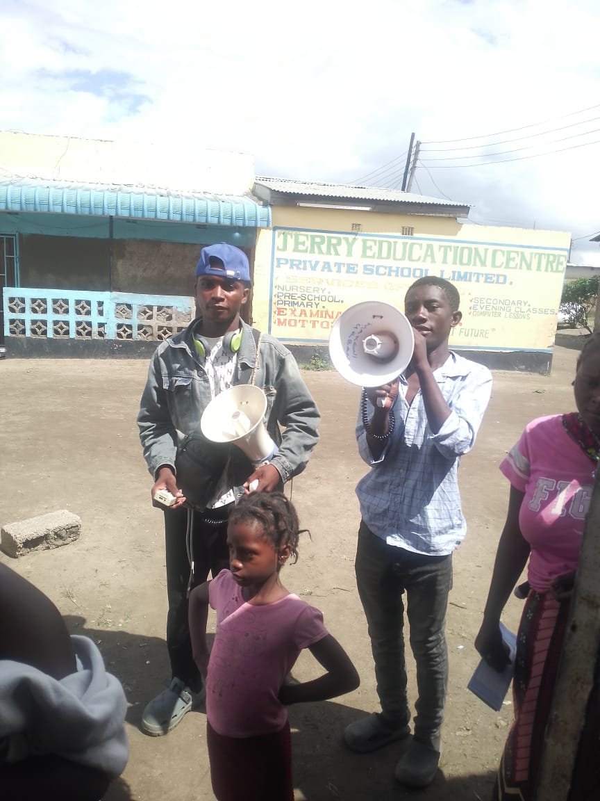 Young people and community leaders gathering outdoors